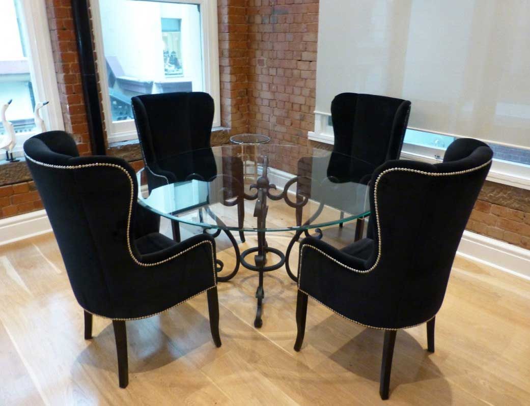 Awesome black wing back dining chair with round glass dining table | Home Interi...