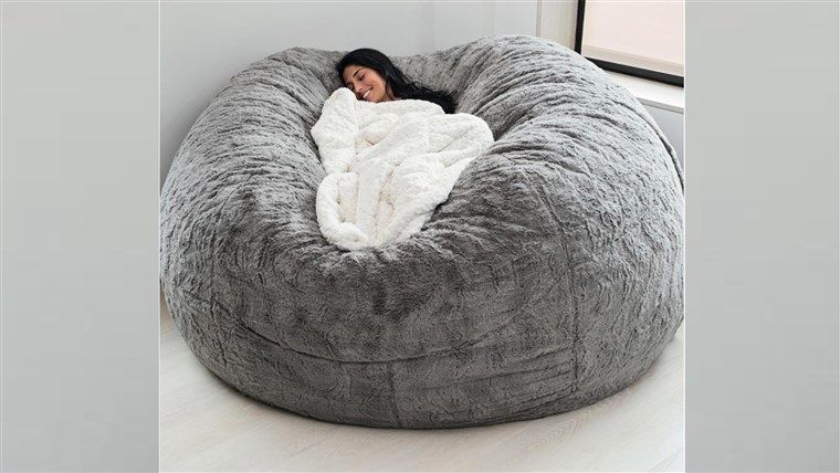 If you need us this fall, we’ll be cuddled up in this huge pillow chair