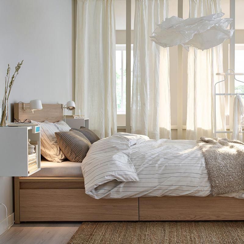Live your bedroom storage dreams with a MALM bed with storage boxes.