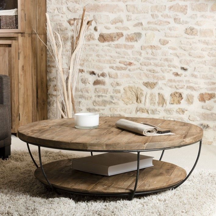 Opt for the industrial style with this round coffee table in solid wood and  – C…