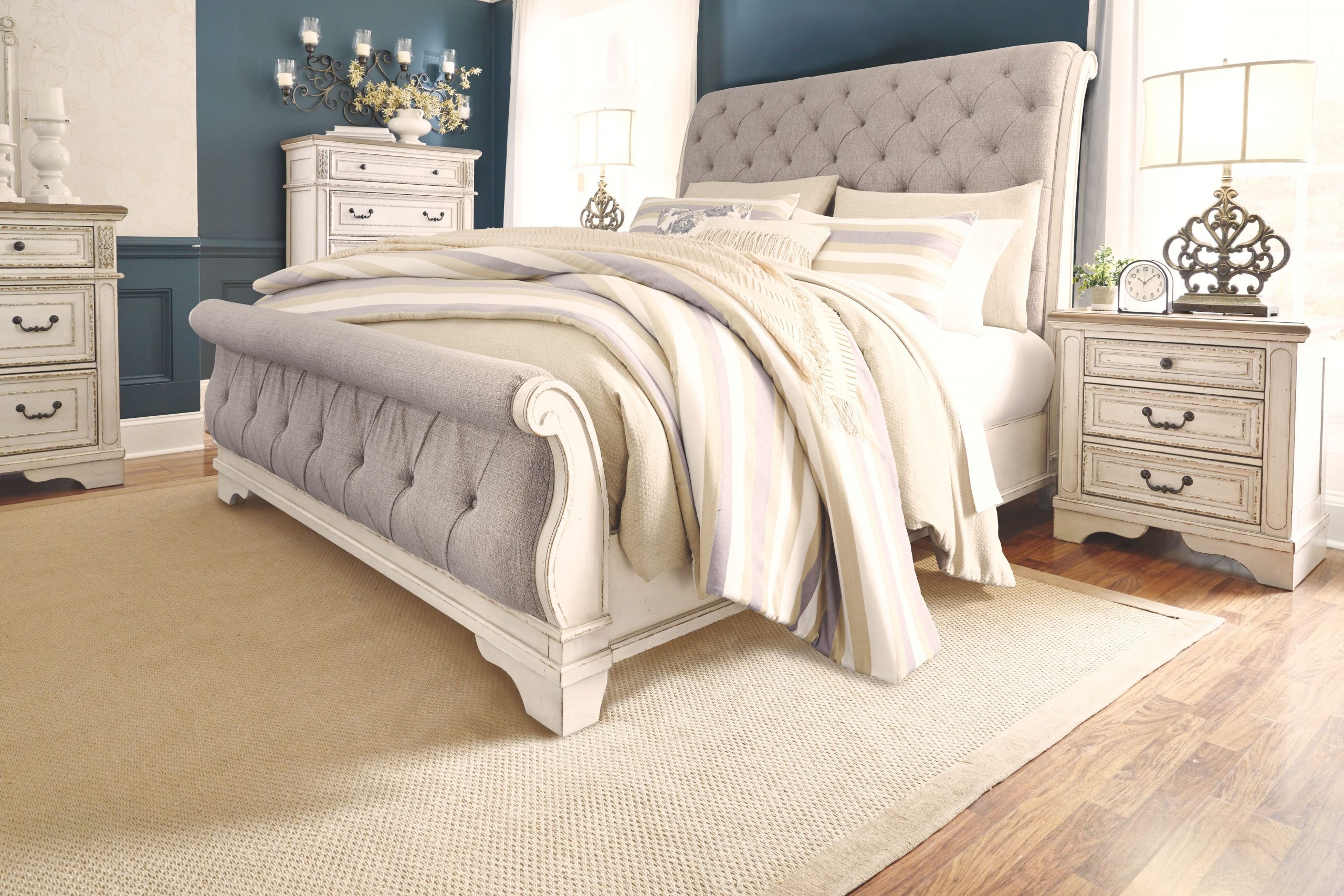 White fabric sleigh bed