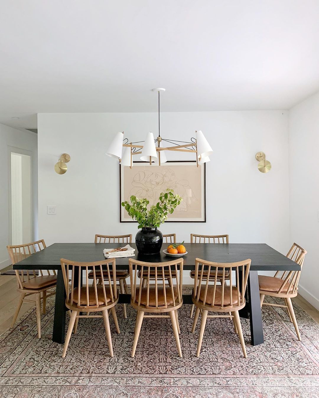 Shoppe Amber Interiors on Instagram: “A Shoppe filled Dining Room— Featuring the Ted Dining Chairs in Sandy Oak and our #MadeByShoppe Ozzie Table in the ebonized finish. Tap to…”