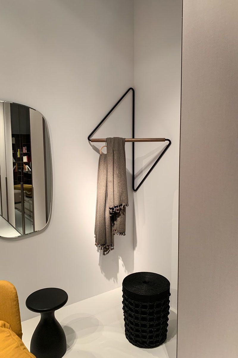 This Clothing Rack Was Designed To Fit Into Corners