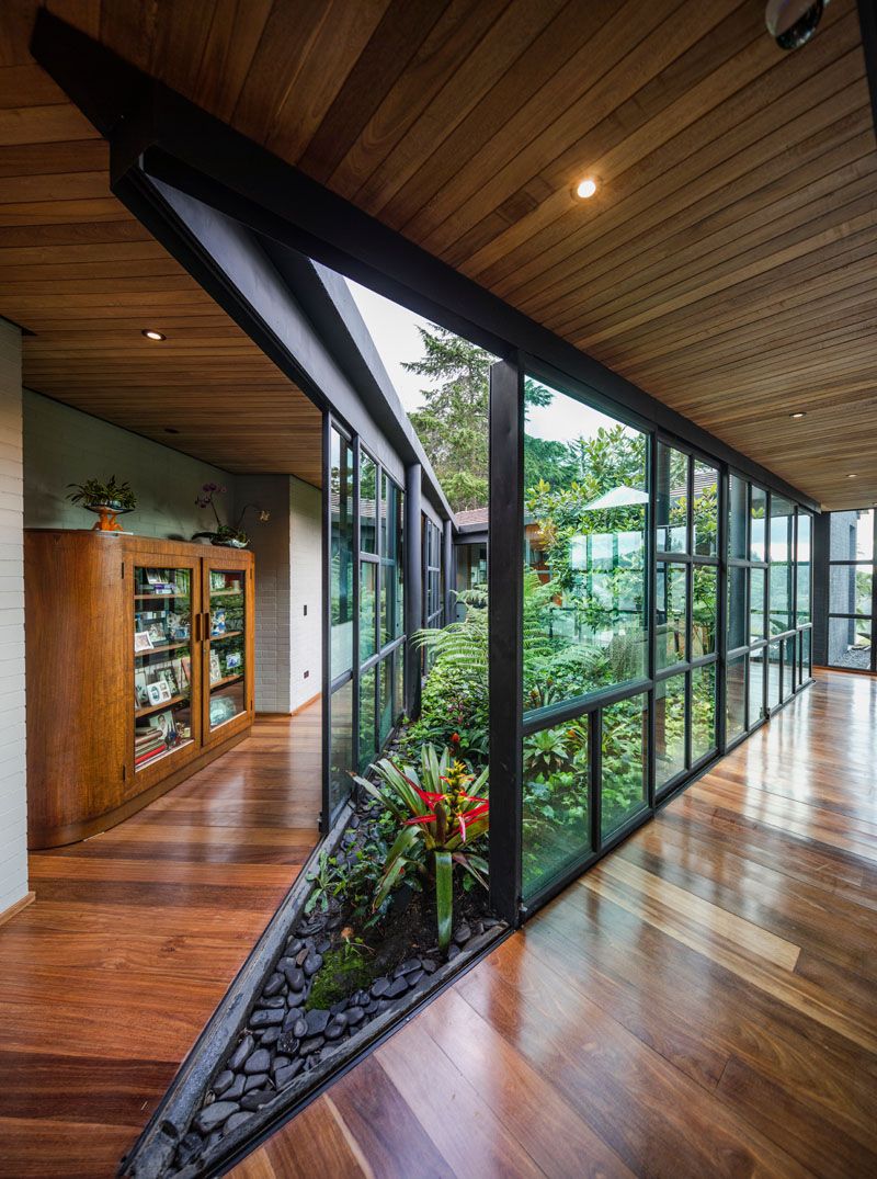 This Triangular Shaped House Makes Room For An Interior Garden