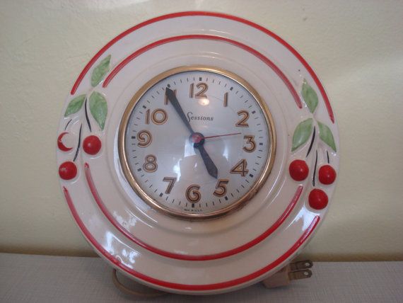 This clock is the cats pajamas! Beautifully painted ceramic, with cherries and s...