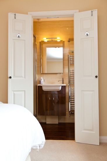 Wardrobe becomes an En-suite:  The owner converted a small walk-in wardrobe, int...