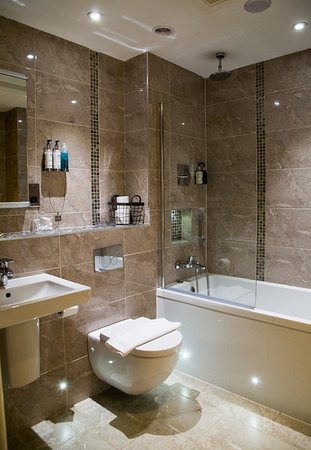 One of our Deluxe bathrooms - featuring new bathroom suites, mood .