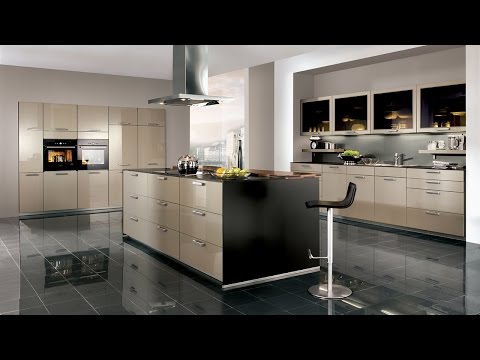 Beautiful modern fitted kitchens - stainless steel & glass .