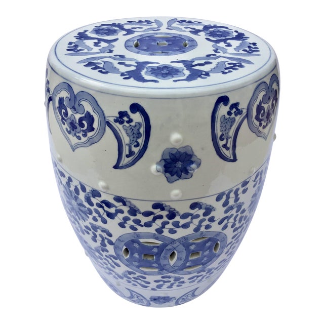 Chinese Porcelain Garden Seat in Blue and White Floral Motif .