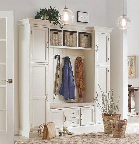 White hall trees with storage for functional entry hallway .