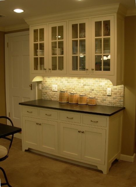 Hang top of buffet on wall, tile behind the shelves, cover top of .