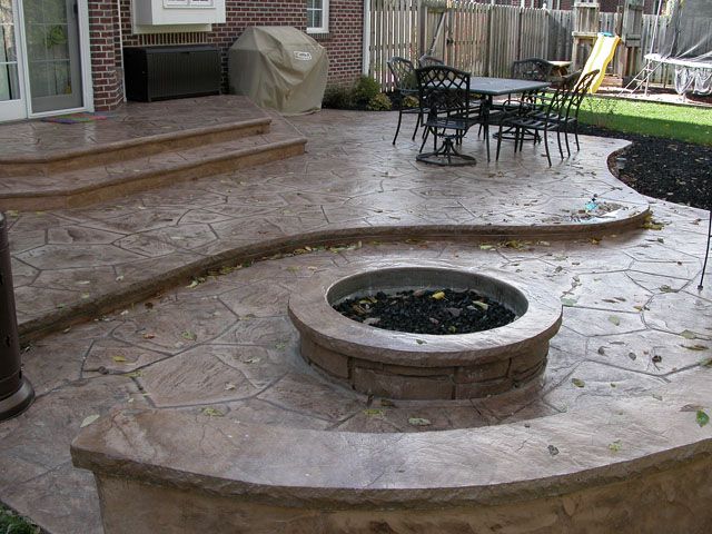 Stamped concrete patio, fire pit, & sitting wall(could have built .