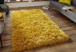 Polar pl95 shaggy rugs in yellow buy online from the rug seller uk .